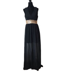 RED Clover Grecian style black backless dress with gold sequin accents.